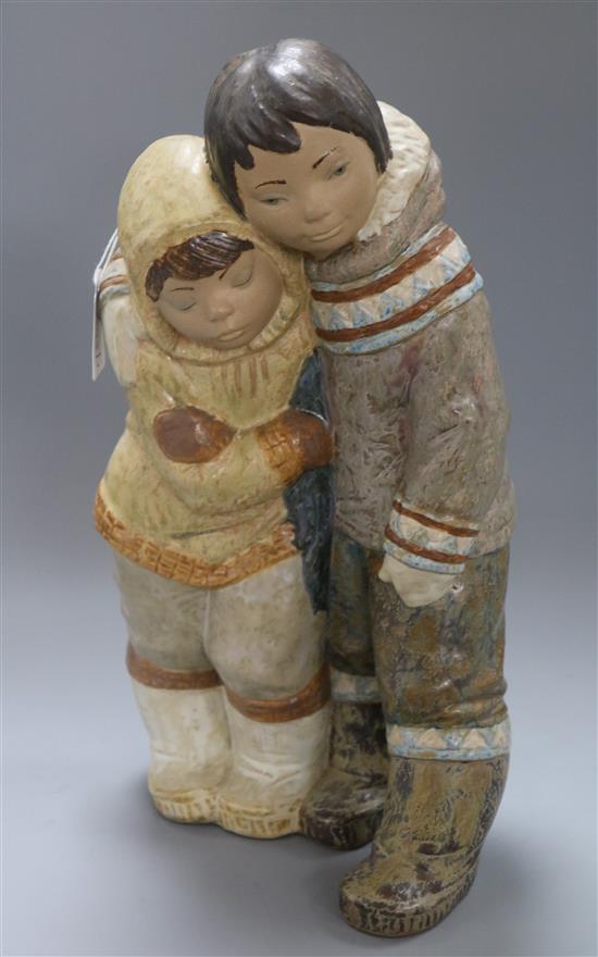 A large Lladro boy and girl Eskimo child group height 38.5cm